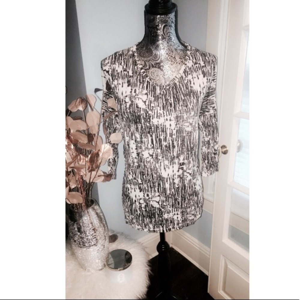 Black and white patterned top with cutout back